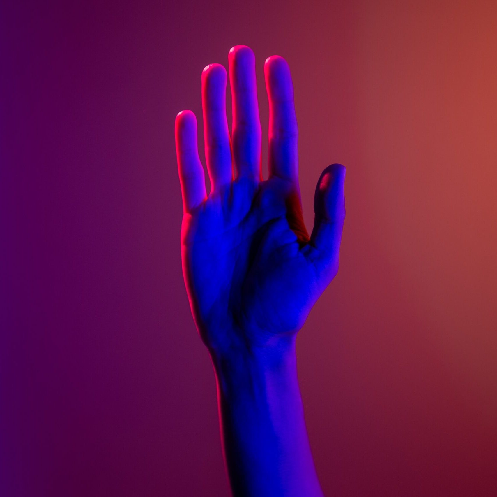 raised hand purple light